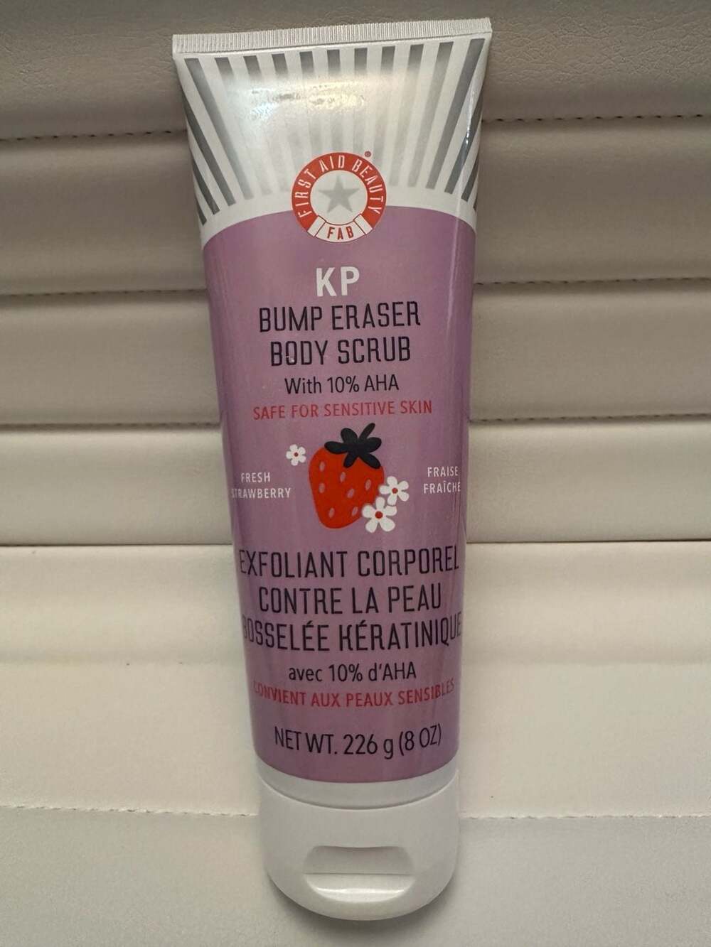 First Aid Beauty KP Bump Eraser Body Scrub with 10% AHA Fresh Strawberry 8 oz